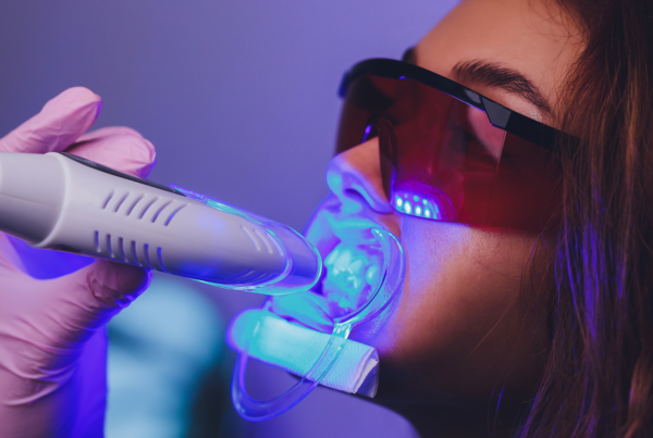 light shining on patient's teeth