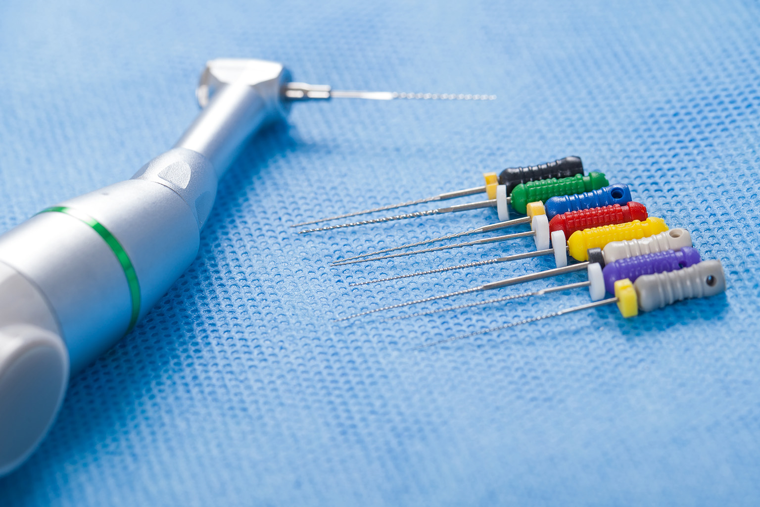 root canal tools on a blue cloth