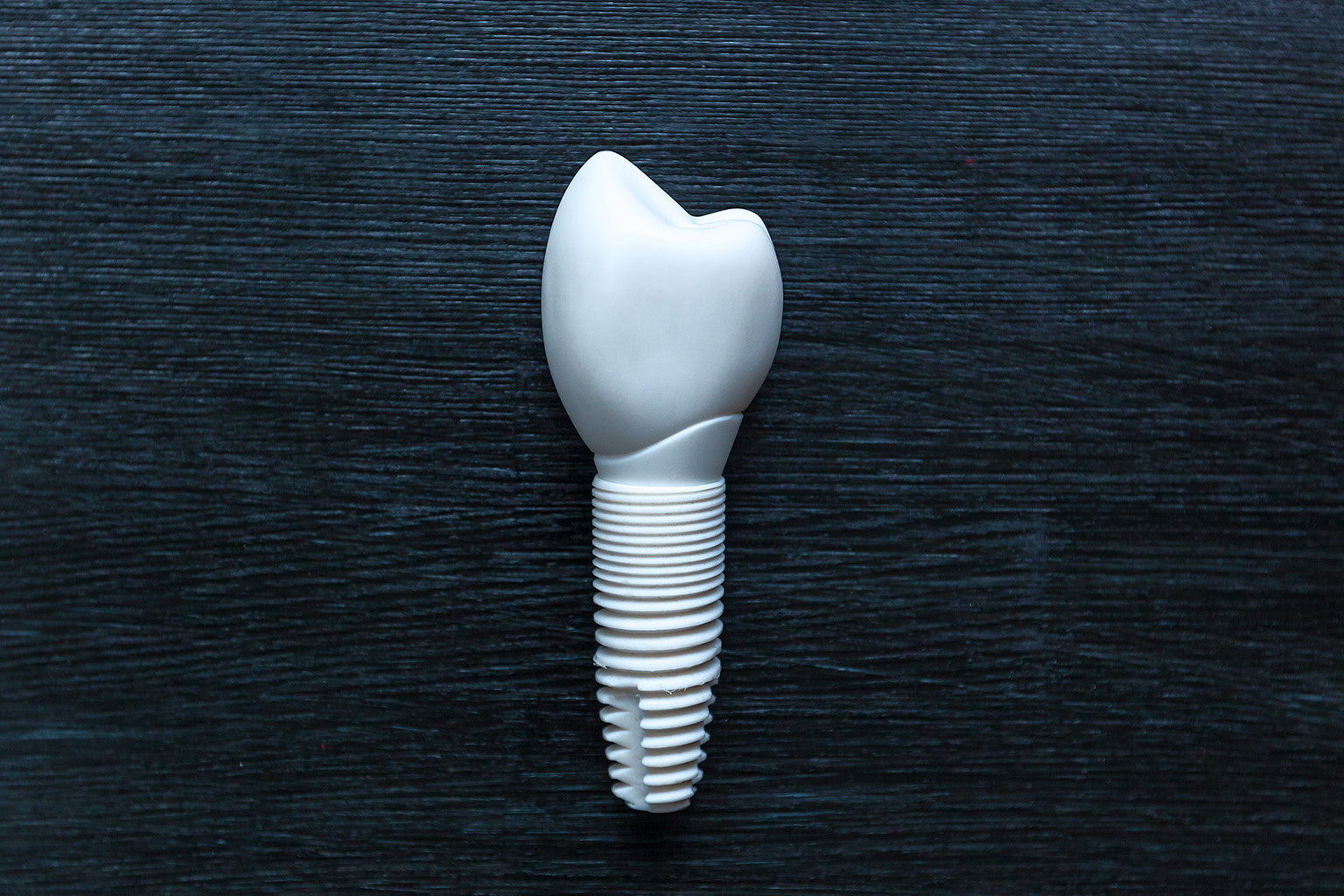 image of a white implant with crown