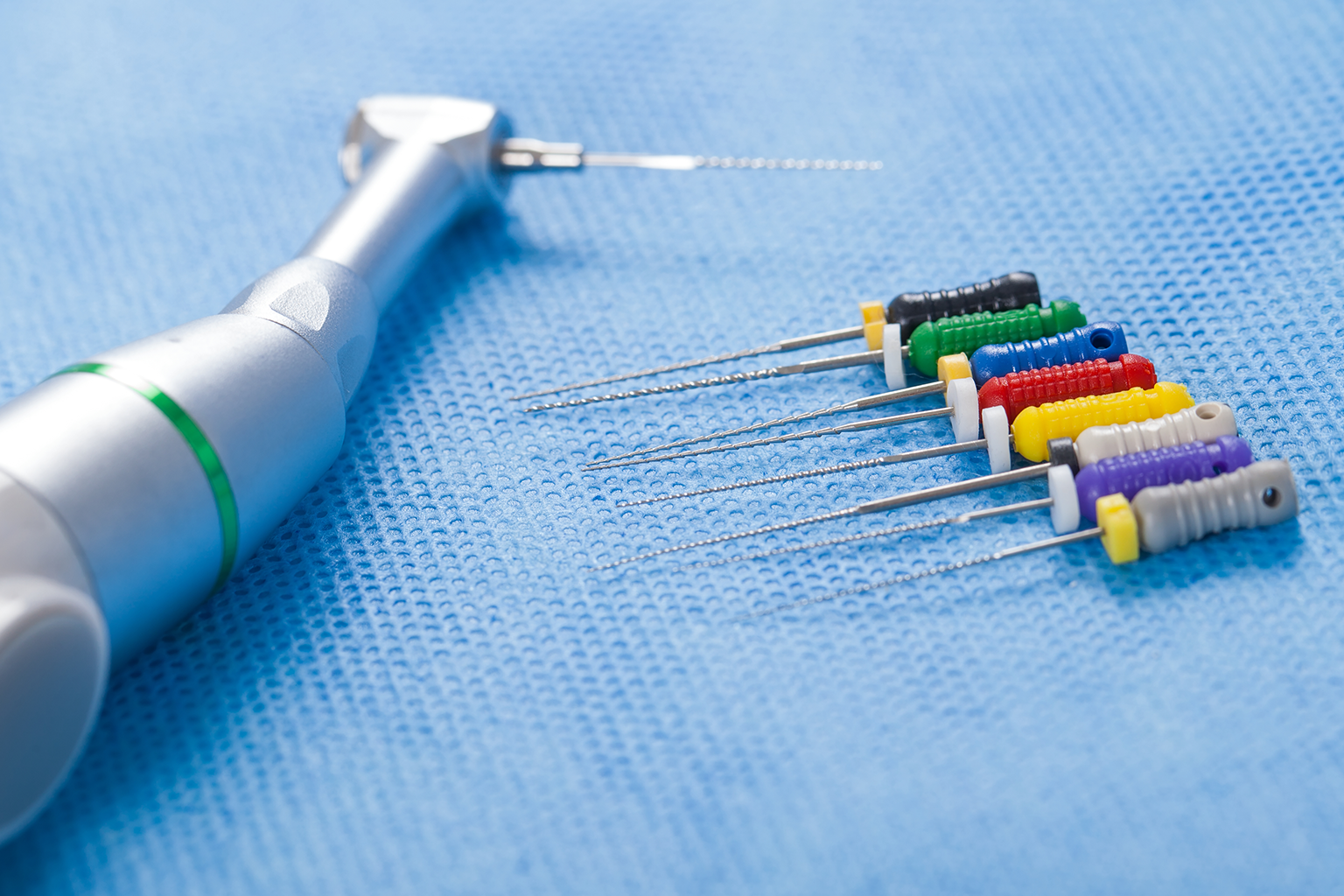 dental tools on blue cloth